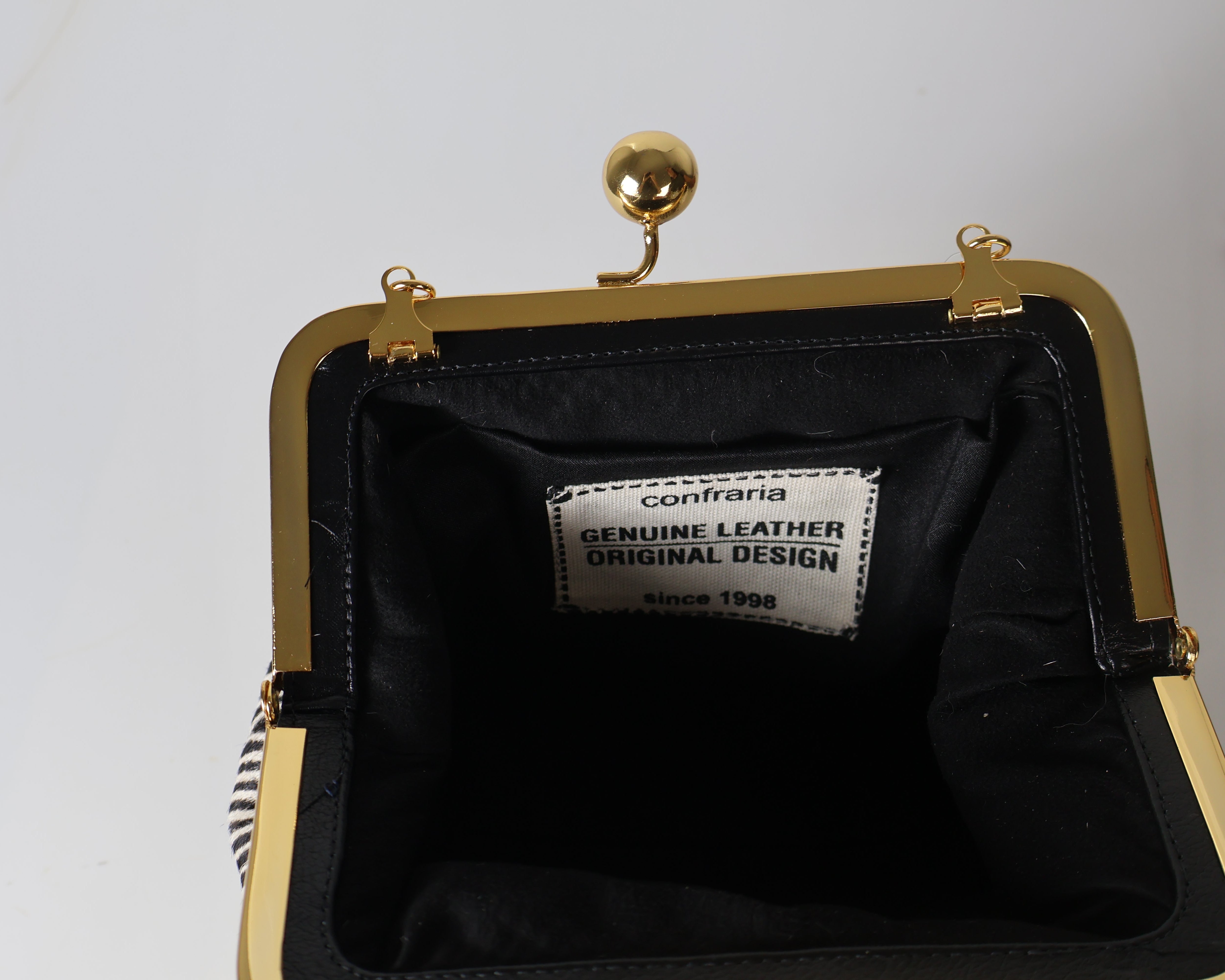Clutch Savana Pêlo Zebra